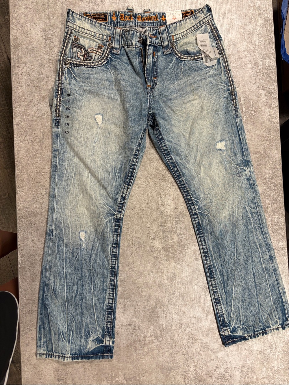 Rock Revival Men's Faded Light Blue Distressed Relaxed Jeans